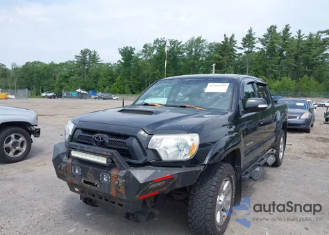 2013 Toyota Tacoma Base V6 z USA, uszkodzony, nr VIN 3TMLU4EN4DM117239